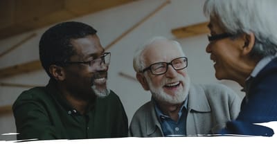 Three seniors enjoying friendly conversation together