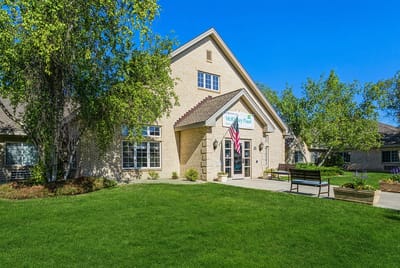 Exterior view of LakeHouse Manitowoc with landscaping