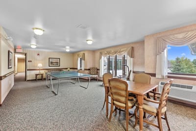 Common area featuring a ping pong table and dining space