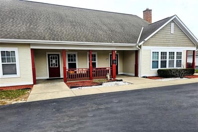 Exterior view of a residential facility with porches