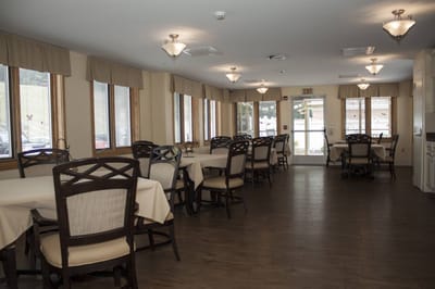Bright dining area with tables and chairs