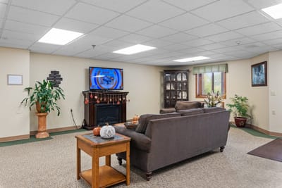 Interior common area with seating and television