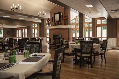 Dining area with tables and chairs in an elegant setting