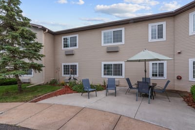 Exterior view of a patio area with seating at Oak Gardens Place