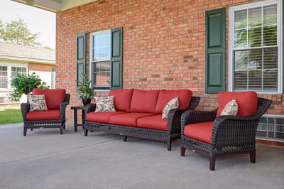 Comfortable outdoor seating area with red cushions