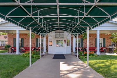 Front entrance of Green Valley Care Center with welcoming patio