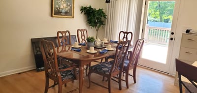 Dining room set up for a meal with natural light