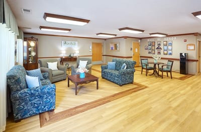 Bright common area with seating and decor