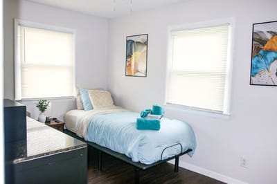 Cozy private resident room with a bed and decor
