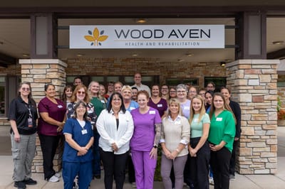 Staff gathering outside the Wood Aven facility