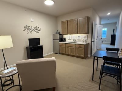 Cozy interior of a resident room with kitchenette