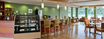 Bright dining area with snacks and seating