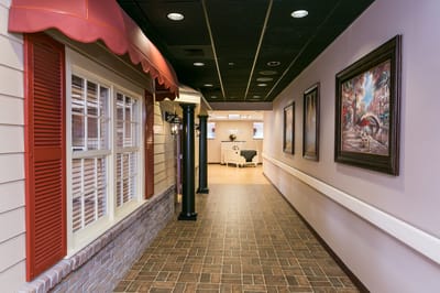 Interior hallway featuring artwork and decorative elements