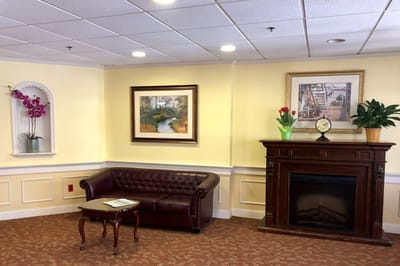 Cozy lobby area with seating and artwork
