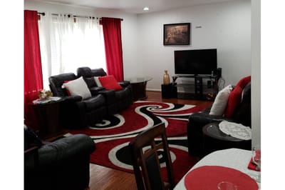 Cozy common area with comfortable seating and a TV