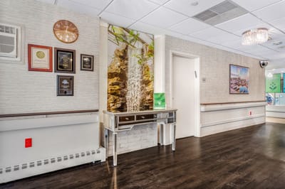 Interior lobby with waterfall feature and awards