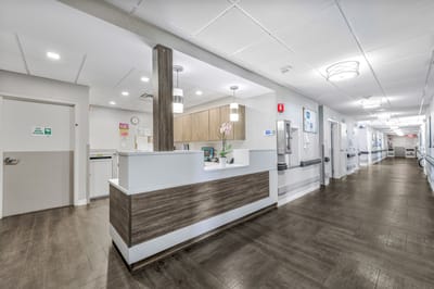 Bright hallway and reception area in a healthcare facility