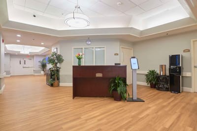 Interior view of the front lobby area with reception desk