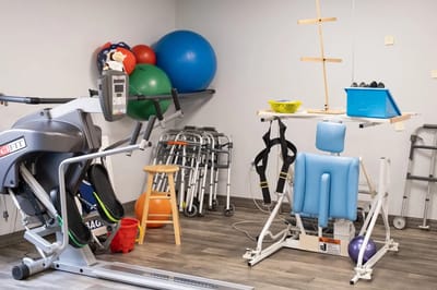 Interior of a therapy room with exercise equipment