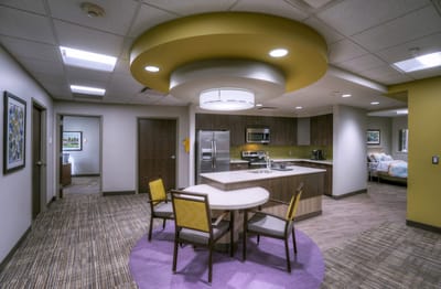 Modern kitchenette and dining area of a resident unit