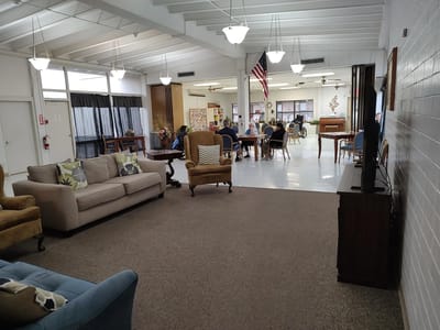 Common area with residents engaged in activities