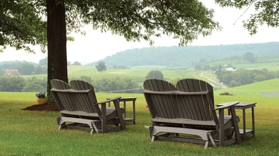 Outdoor seating area overlooking a serene landscape