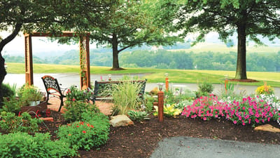 Beautiful garden area with flowers and benches