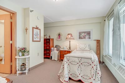 Cozy resident room with personal decor and furniture