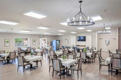 Bright dining room with tables and chairs