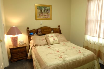 Cozy private room with a bed and decor