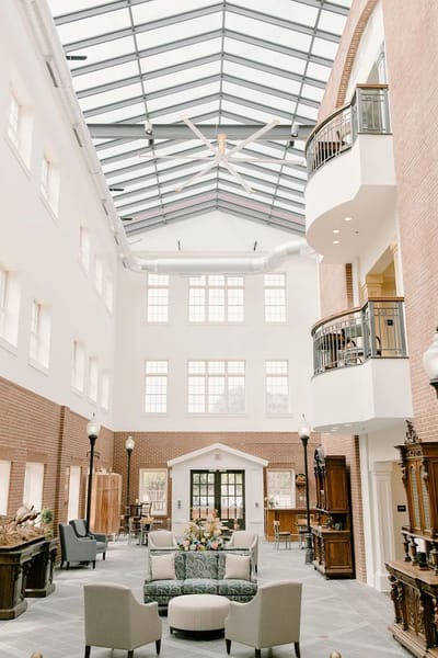 Interior view of a bright common area with seating