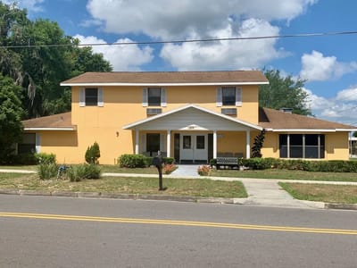 Exterior view of Eustis Senior Care facility