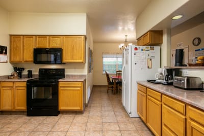 Bright, spacious kitchen area in a senior living facility