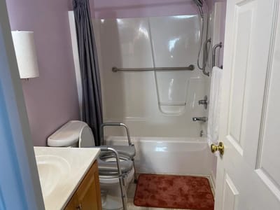 Accessible bathroom with safety features and grab bars