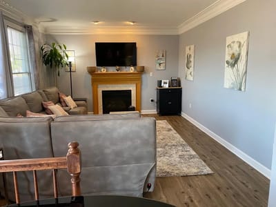 Cozy common area with a fireplace and seating