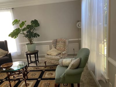 Cozy common area with comfortable seating and natural light