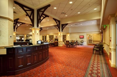 Interior common area with seating and bookshelves