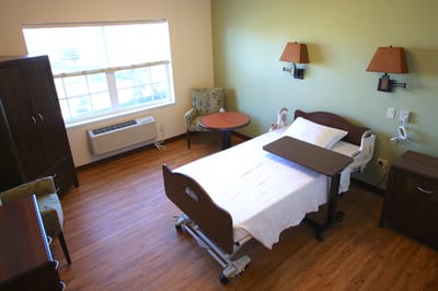 Bright, accessible resident room with furnishings