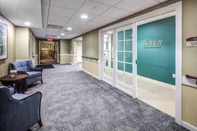 Interior hallway leading to a wellness program room