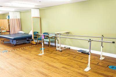 Interior view of a rehabilitation room with equipment