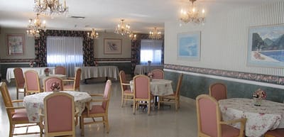 Dining area with tables and floral decorations