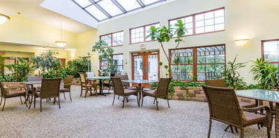 Bright common area with plants and seating