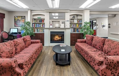 Cozy common area with seating and a fireplace