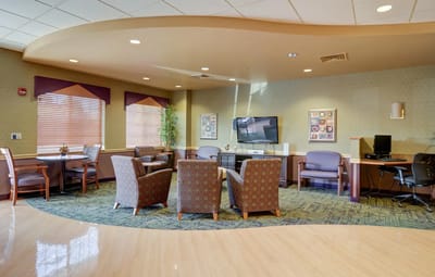 Common area with seating and a TV