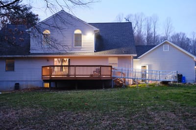 Exterior view of a residential building with a deck