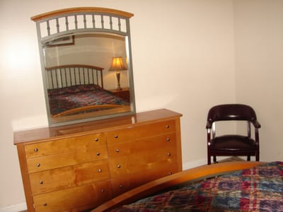 Private room with dresser and mirror