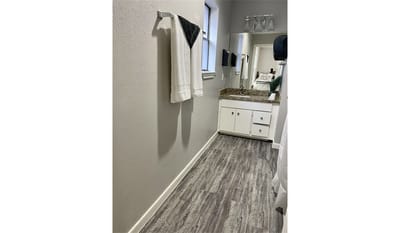 Bathroom with towels and a mirror