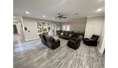 Common area with seating and entertainment space.