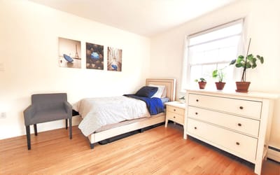 Cozy resident room with bed and decor