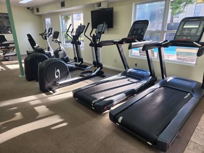 Interior view of a fitness room with exercise equipment